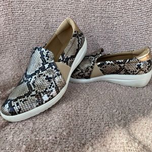 Brown and gold snake print slip on’s. Size 8